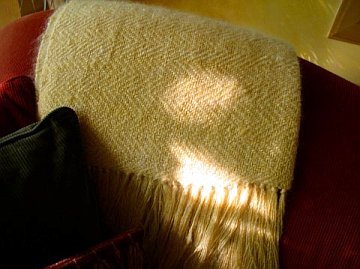 Closeup image of the sun throw weave