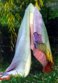 a rainbow colored hand woven mohair throw