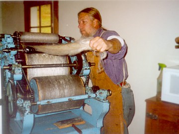 Stan at the carding machine